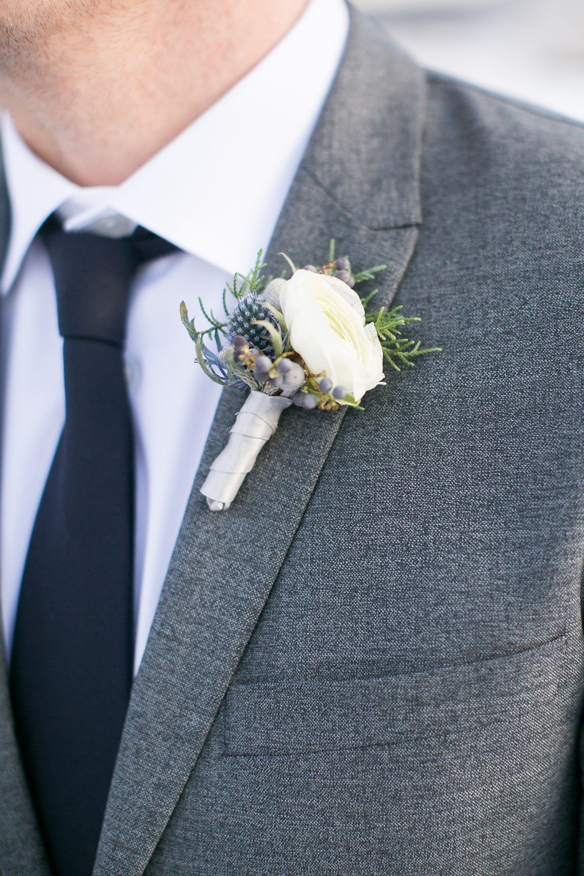 Winter Wedding Boutonniere, Colorado Devils Thumb Ranch Winter Mountain Wedding, Amy Caroline Photography