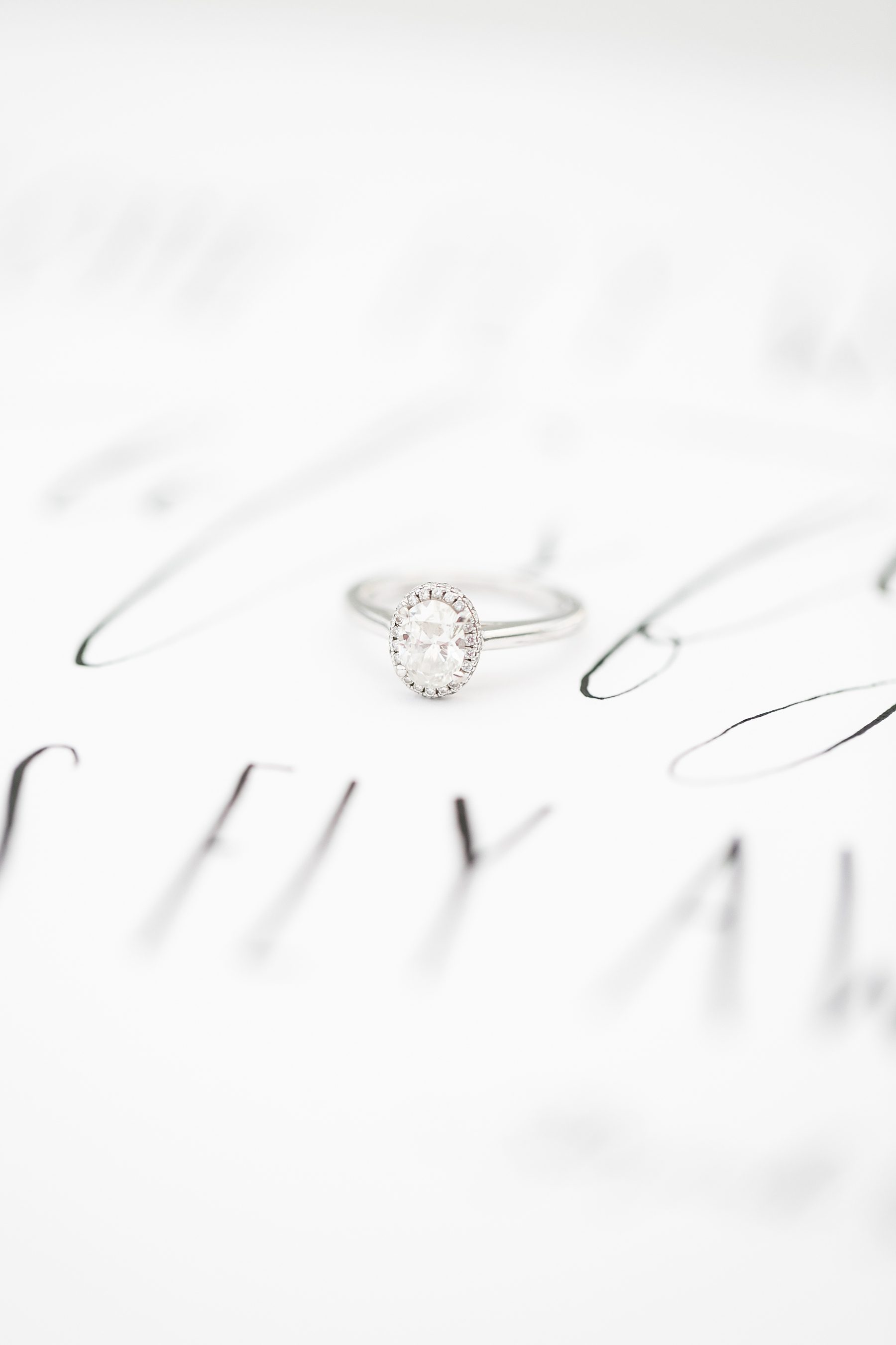 Classic Engagement Ring, Ring on Calligraphy quote, Amy Caroline Photography 