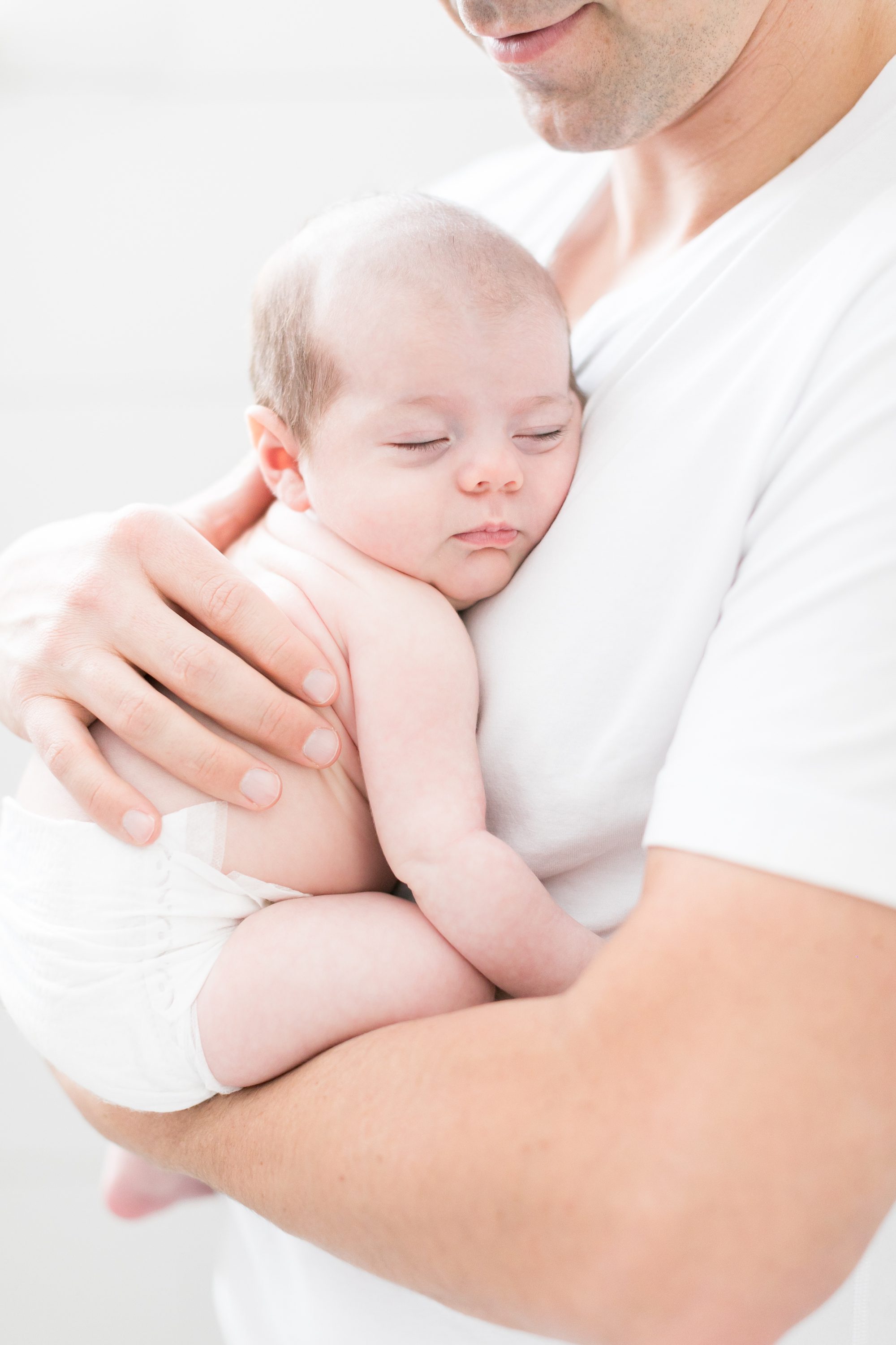 Daddy and Newborn baby from Denver newborn family photos, Amy Caroline Photography 