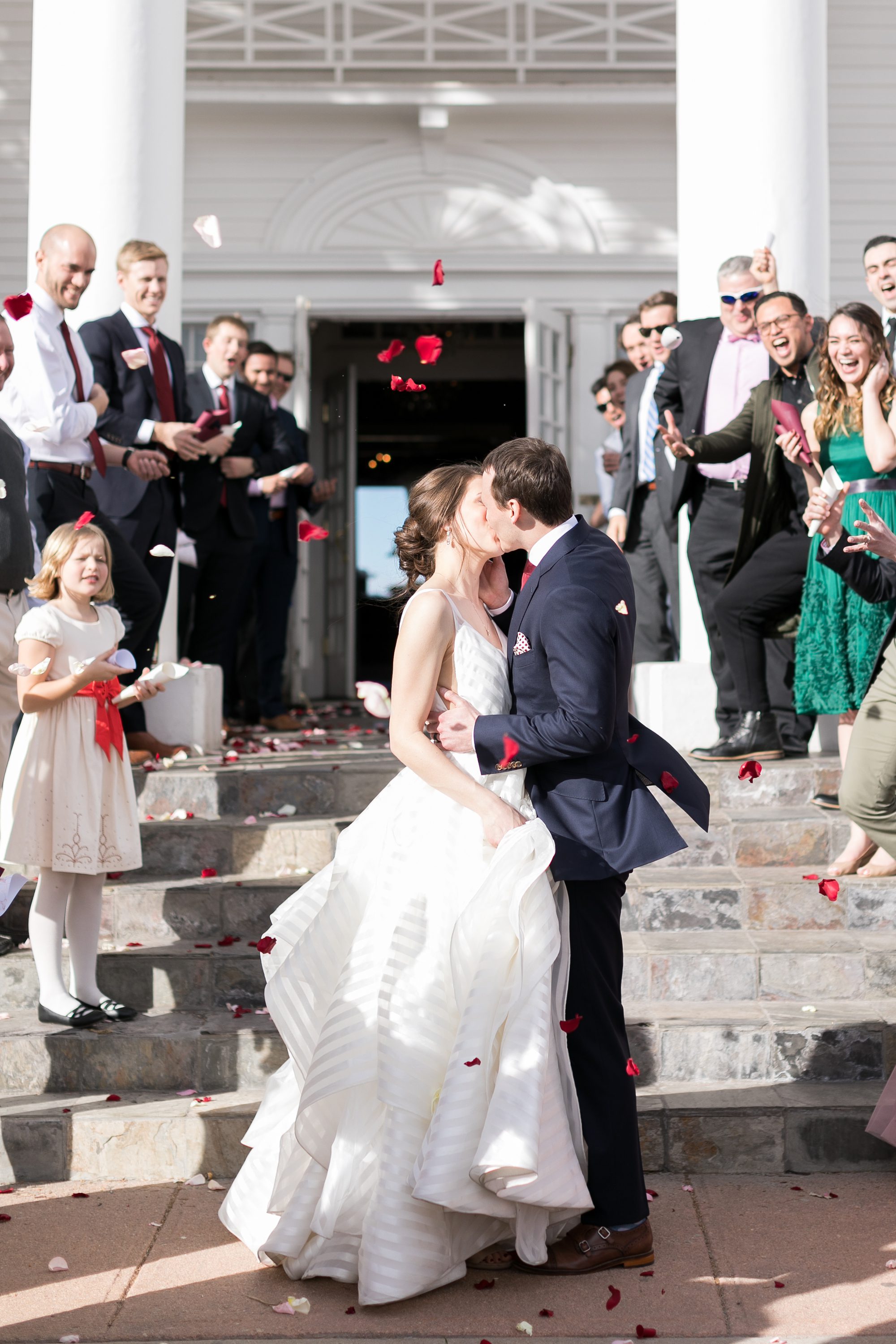 Bride and Groom Wedding Exit with Rose Petals, Elegant Denver Wedding Photographers, Amy Caroline Photography 