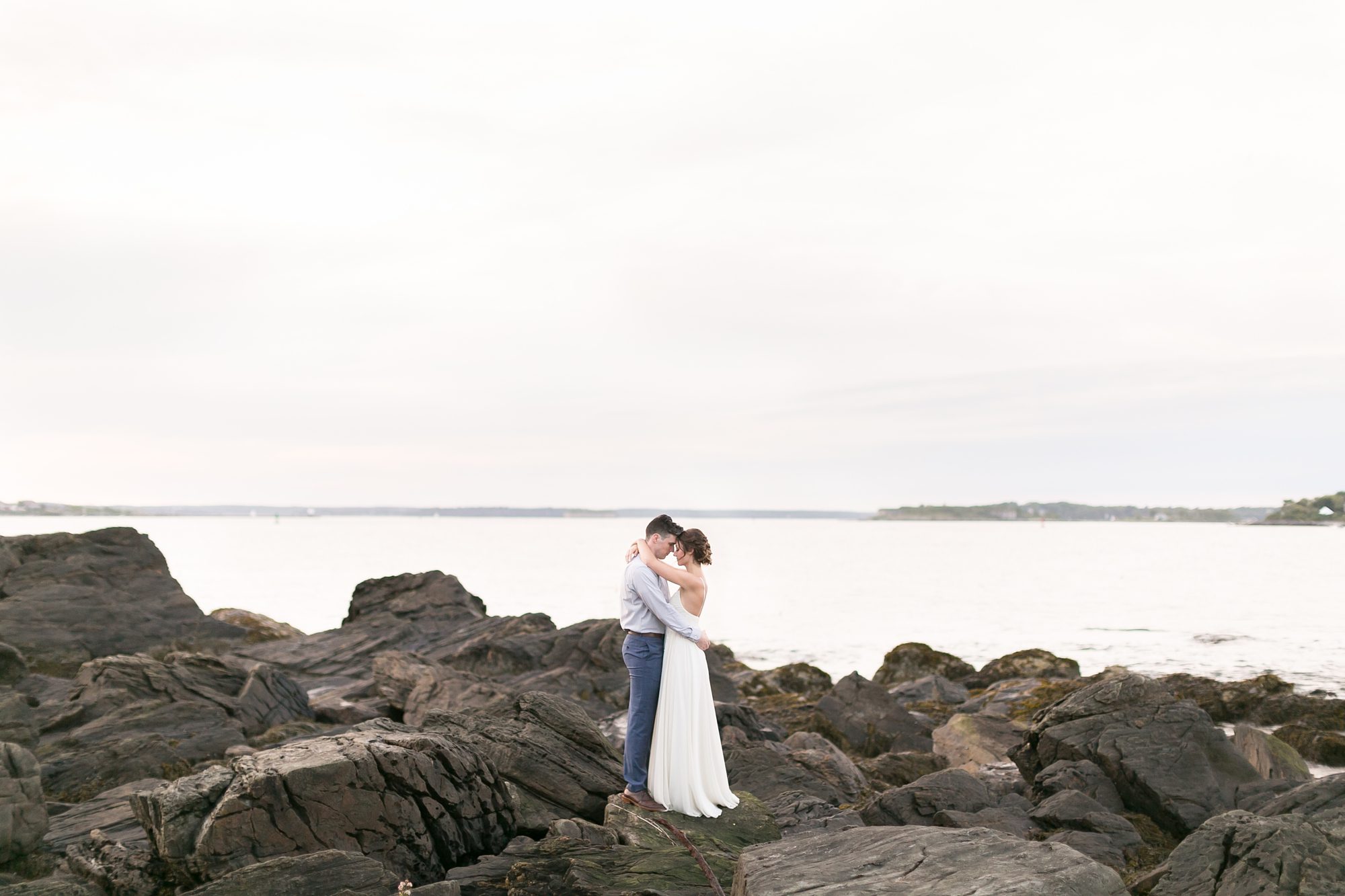 Bride and Groom at sunset on the beach in Portland Maine, Portland Maine Beach Wedding, Rocky Ocean Wedding Inspiration, Maine Wedding Photography, Amy Caroline Photography 