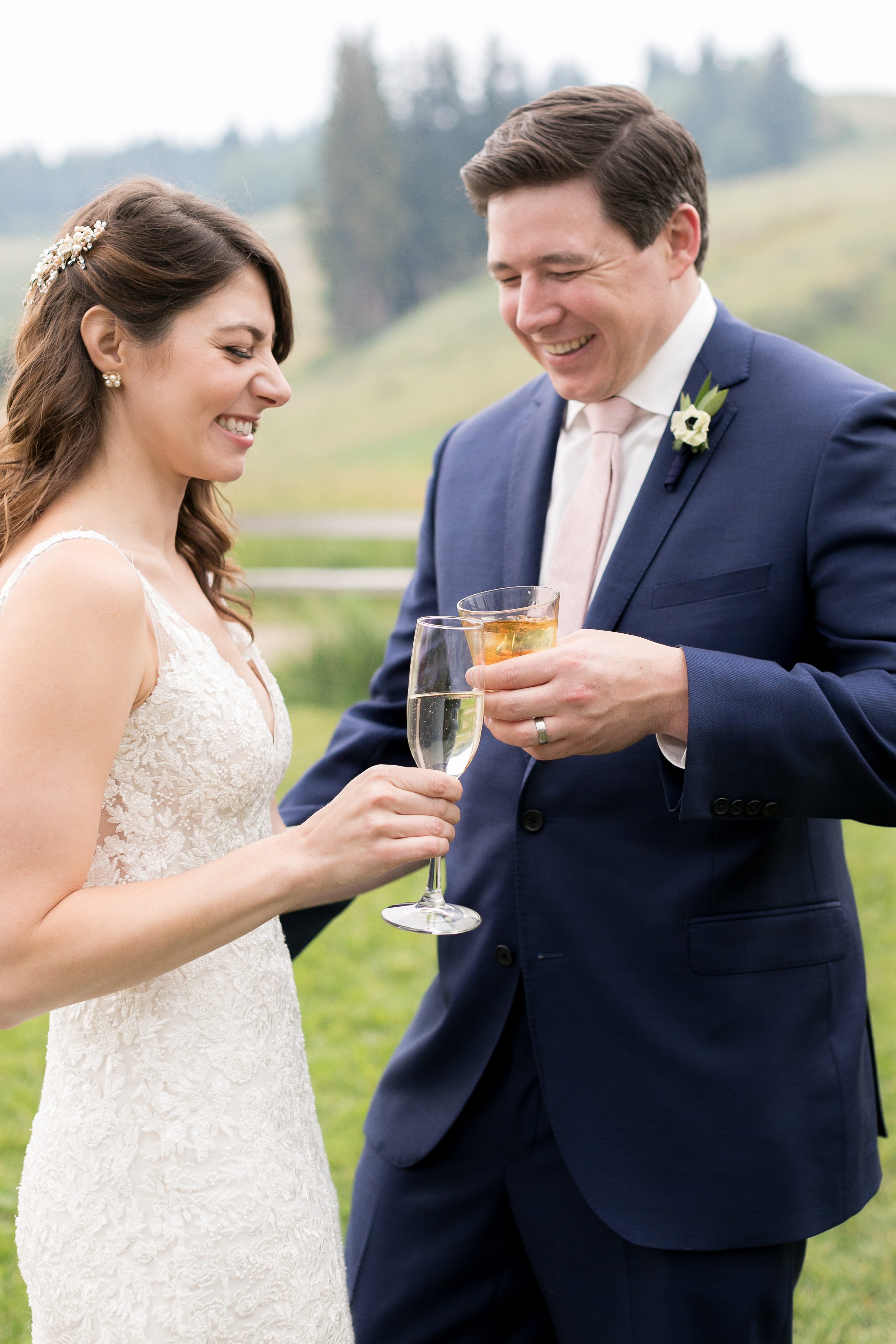 Happy Bride and Groom at cocktail hour. Aspen Colorado Mountain Wedding. Amy Caroline Photography.
